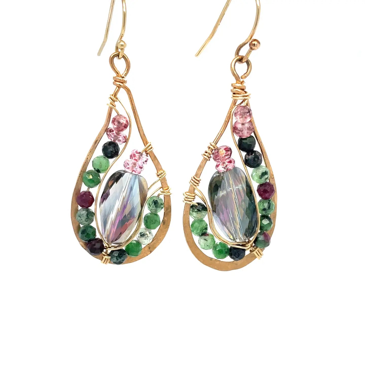 Pair of gold teardrop earrings with multicolored gemstones on a white background