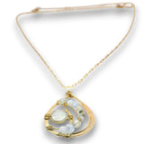A gold chain necklace with a crescent-shaped pendant featuring light blue gemstone beads and a central round white stone, displayed on a clean white background.