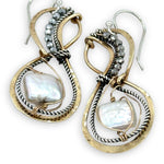 brass infinity shaped earrings are lined with oxidized sterling silver twist with pyrite and fresh water pearl tile accents