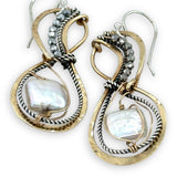brass infinity shaped earrings are lined with oxidized sterling silver twist with pyrite and fresh water pearl tile accents