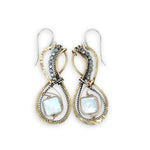 brass infinity shaped earrings are lined with oxidized sterling silver twist with pyrite and fresh water pearl tile accents