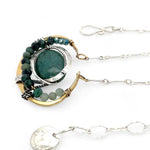  brass cup necklace with smooth african opal jasper oval wrapped in hammered sterling silver, oxidized sterling twist, emerald gemstones, and crystal