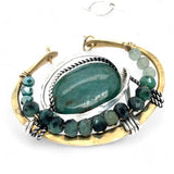  brass cup necklace with smooth african opal jasper oval wrapped in hammered sterling silver, oxidized sterling twist, emerald gemstones, and crystal