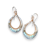 A pair of sterling silver and bronze channel hoop earrings featuring amazonite and labradorite gemstones