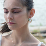 Brass oval earrings with oxidized sterling twist and sterling hammered details with amazonite coins wrapped in gold filled wire with built in sterling silver earring hooks that wear like a post earring