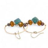 Chrysocolla diamonds are held within bronze hammered hoop earrings with amber crystal and chocolate fresh water pearl accents