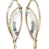 Faceted amethyst drops hang from a brass marquise earring with hammered sterling silver arches and faceted fluorite gemstones