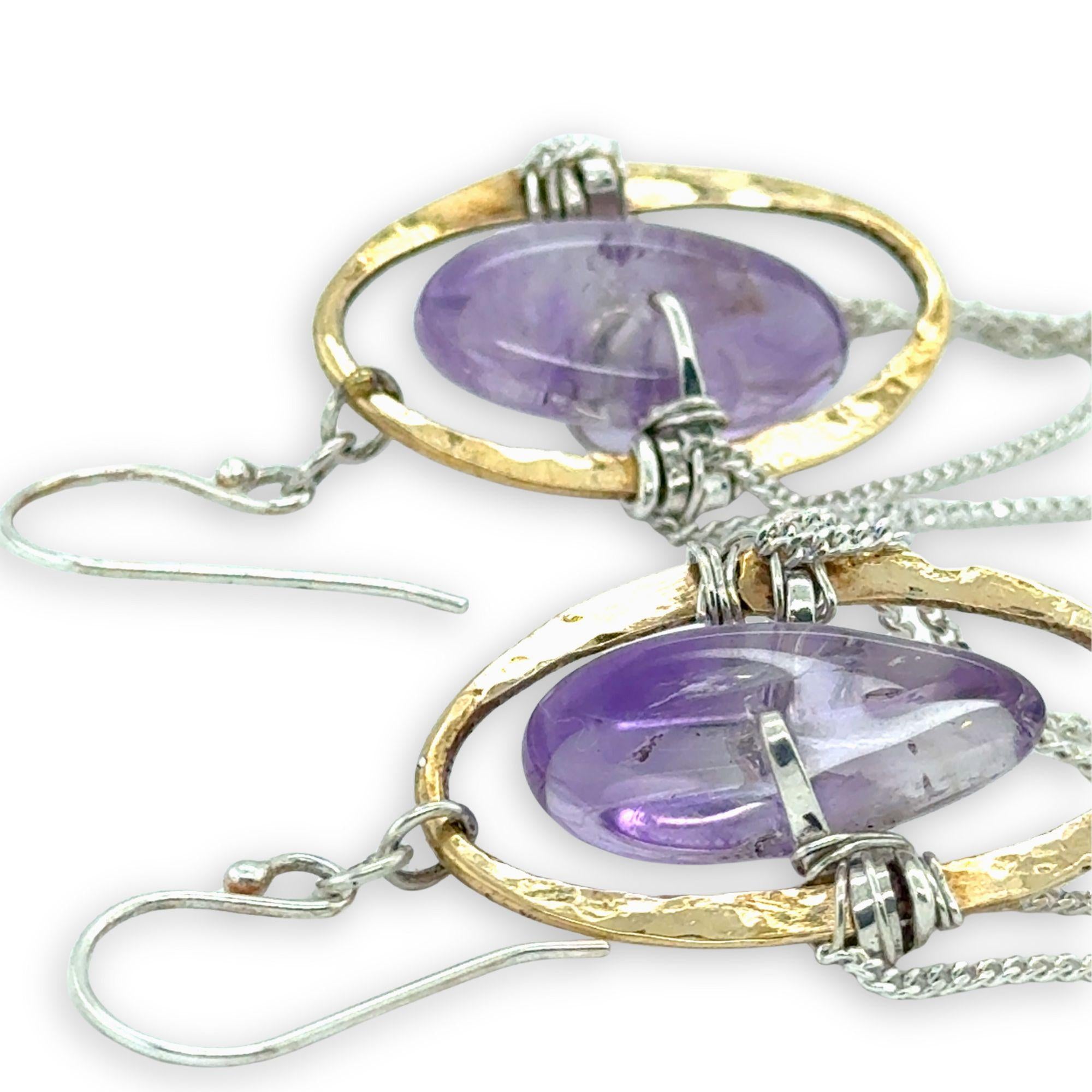 Brass hammered oval and sterling silver delicate chain chandelier earrings holding smooth amethyst pebble gemstones