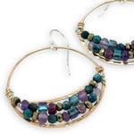 handmade hammered bronze channel hoops with a mix of amethyst, chrysocolla, pyrite, and crystal cube gemstones on sterling silver wire