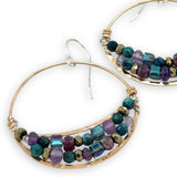 handmade hammered bronze channel hoops with a mix of amethyst, chrysocolla, pyrite, and crystal cube gemstones on sterling silver wire
