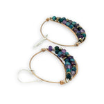 handmade hammered bronze channel hoops with a mix of amethyst, chrysocolla, pyrite, and crystal cube gemstones on sterling silver wire