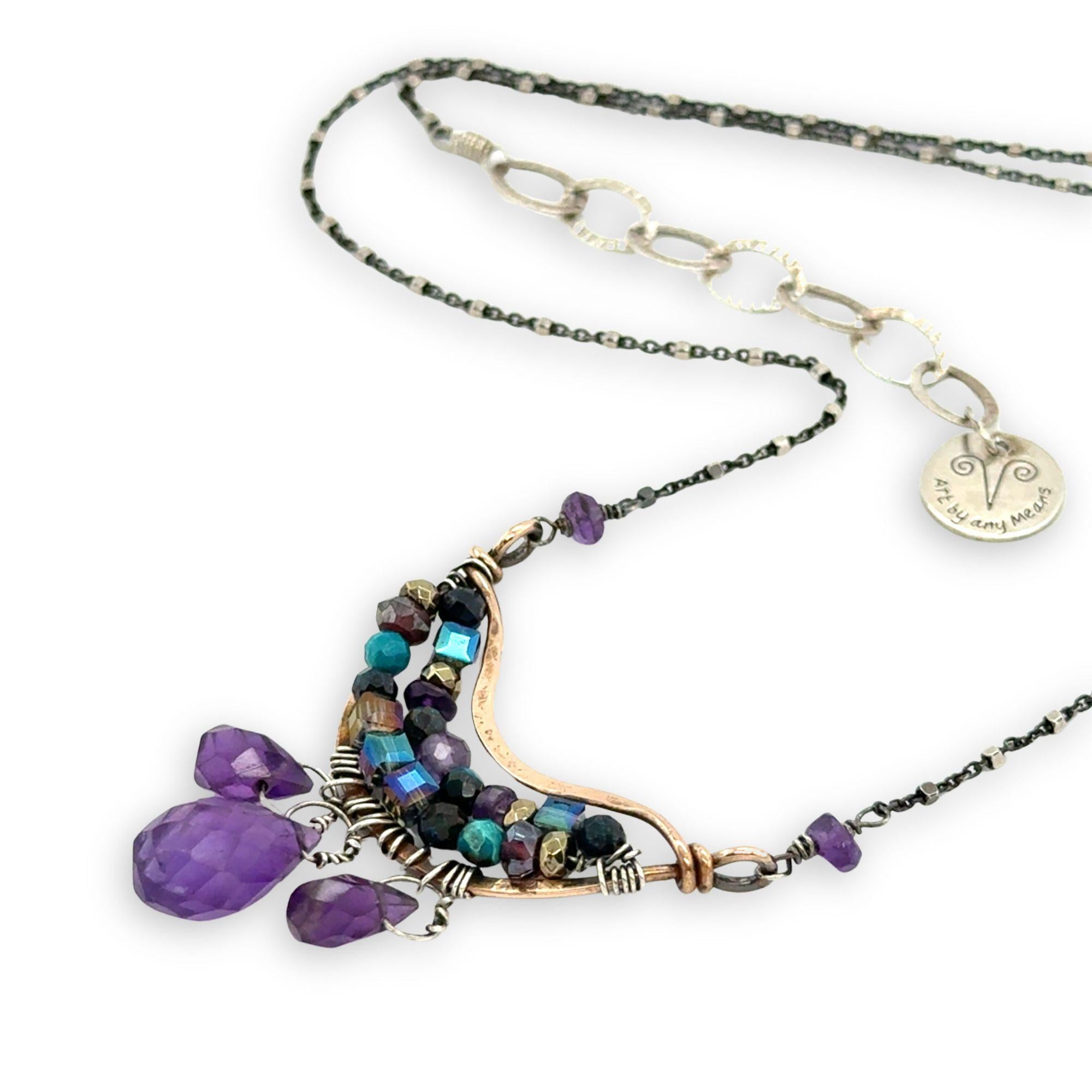 Handmade hammered bronze mini pendant embellished with amethyst, chrysocolla, pyrite, and crystal cubes with faceted amethyst drops hanging from the bottom, on oxidized sterling silver dot chain