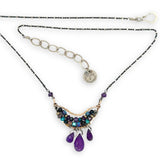 Handmade hammered bronze mini pendant embellished with amethyst, chrysocolla, pyrite, and crystal cubes with faceted amethyst drops hanging from the bottom, on oxidized sterling silver dot chain