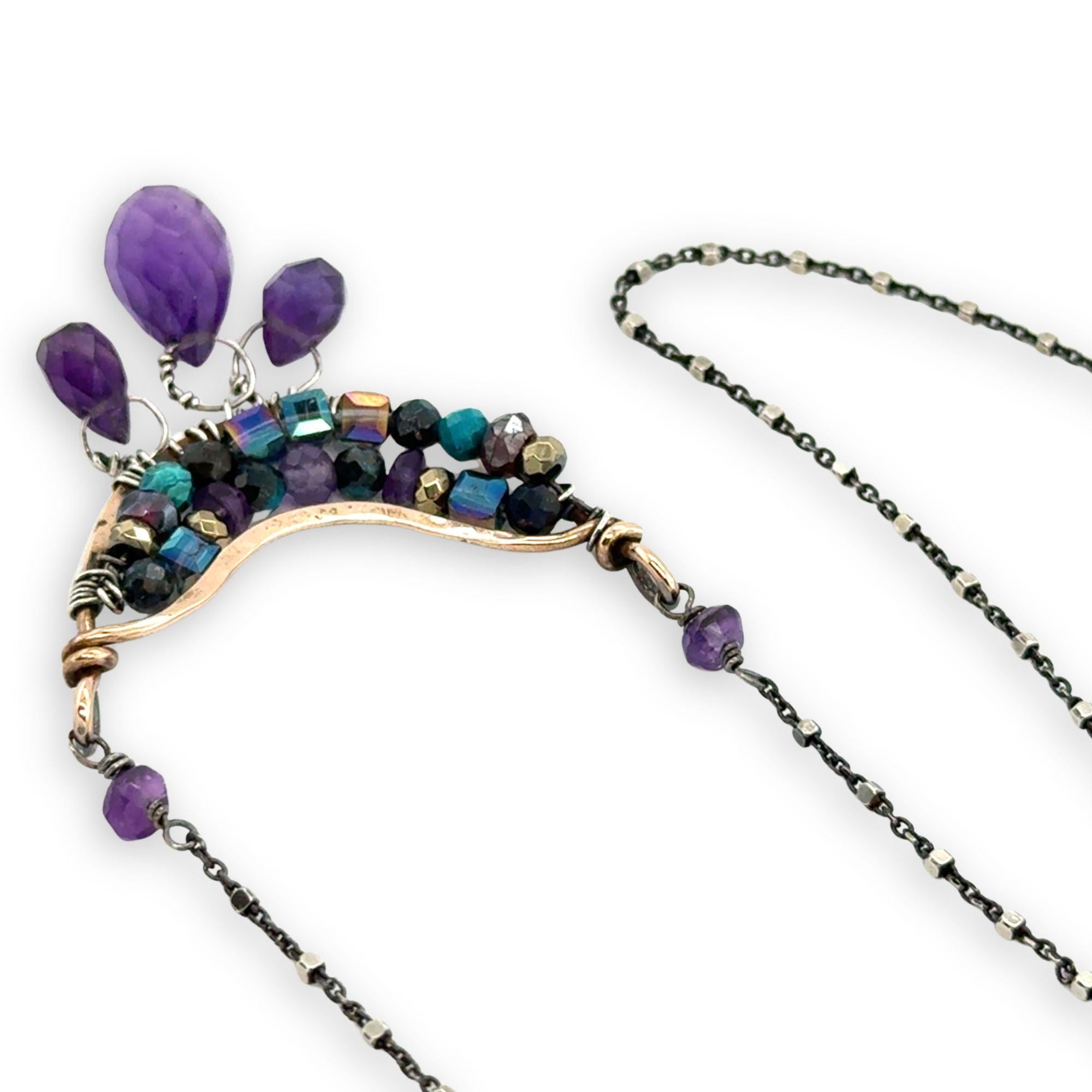 Handmade hammered bronze mini pendant embellished with amethyst, chrysocolla, pyrite, and crystal cubes with faceted amethyst drops hanging from the bottom, on oxidized sterling silver dot chain