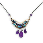 Handmade hammered bronze mini pendant embellished with amethyst, chrysocolla, pyrite, and crystal cubes with faceted amethyst drops hanging from the bottom, on oxidized sterling silver dot chain