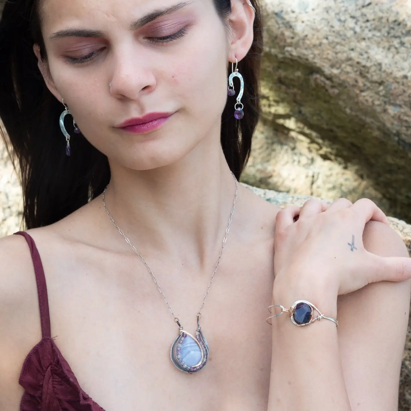 Mini sterling silver cane shaped earrings with purple amethyst dangles