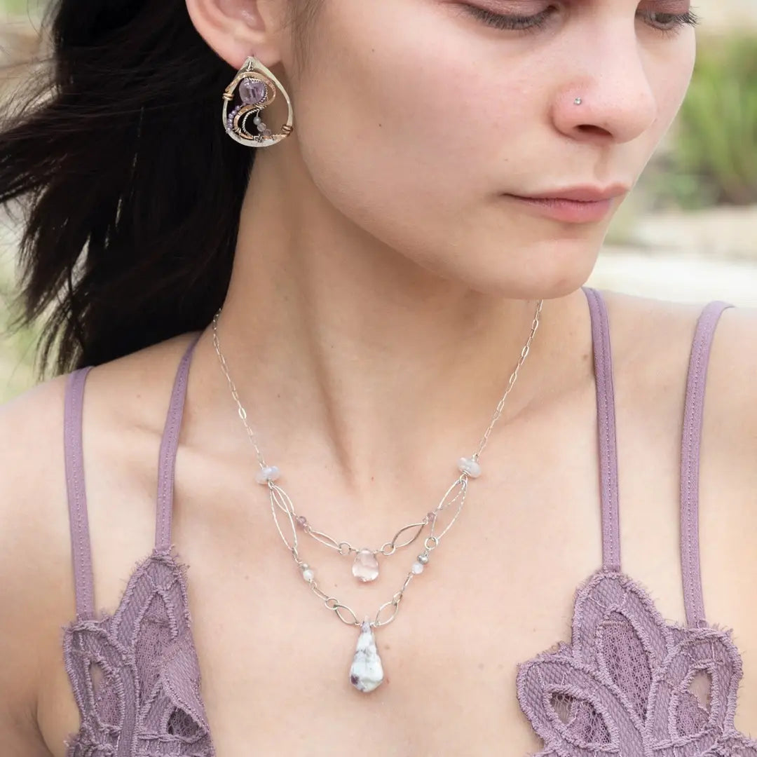 Dandelion stamped sterling silver drop earrings with snaking hammered bronze wire and oxidized sterling twist wire accented with amethyst cubes, cubic zirconia, and fluorite gemstones with built in post style earring hooks