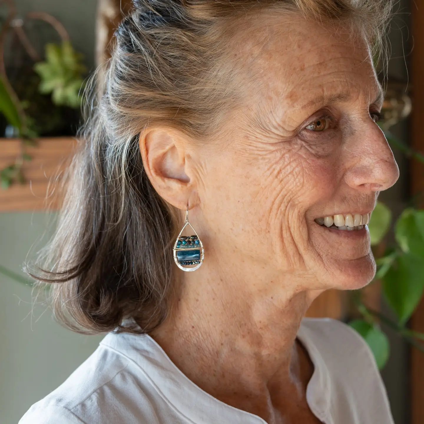 Sterling silver hammered drop earrings with smooth apatite tiles, chrysocolla, muted purple fresh water pearl, and crystal wrapped in gold filled wire
