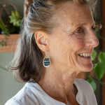 Sterling silver hammered drop earrings with smooth apatite tiles, chrysocolla, muted purple fresh water pearl, and crystal wrapped in gold filled wire