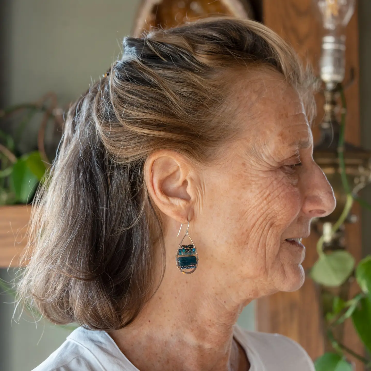 Sterling silver hammered drop earrings with smooth apatite tiles, chrysocolla, muted purple fresh water pearl, and crystal wrapped in gold filled wire