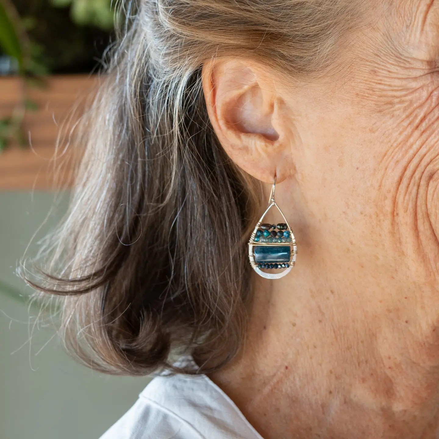 Sterling silver hammered drop earrings with smooth apatite tiles, chrysocolla, muted purple fresh water pearl, and crystal wrapped in gold filled wire