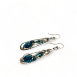 Apatite gemstones accented with blue quartz, chrysocolla, crystal, and bright apatite gemstones wrapped in bronze and gold filled wire inside darkened sterling silver long drop earrings