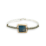 Sterling silver slim bracelet with a smooth apatite tile center surrounded by hammered brass and pyrite gemstone accents