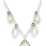 Charm necklace with bronze, sterling silver, and darkened sterling braided petal shapes, accompanied by opal, a carved aquamarine flower, apatite, and crystal gemstones