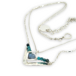 Arrow shaped sterling silver hammered pendant necklace with flashy labradorite nugget and chrysocolla cube gemstones on a double chain