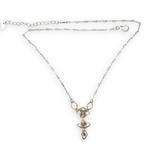 Gold filled hammered diamond shapes filled with rutilated quartz faceted gemstones to form a y shape necklace