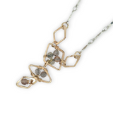Gold filled hammered diamond shapes filled with rutilated quartz faceted gemstones to form a y shape necklace