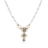 Gold filled hammered diamond shapes filled with rutilated quartz faceted gemstones to form a y shape necklace