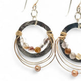 leaf stamped mini hoop earrings with rutilated quartz, gold filled wire webs, and champagne colored fresh water pearl