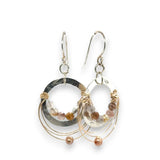 leaf stamped mini hoop earrings with rutilated quartz, gold filled wire webs, and champagne colored fresh water pearl