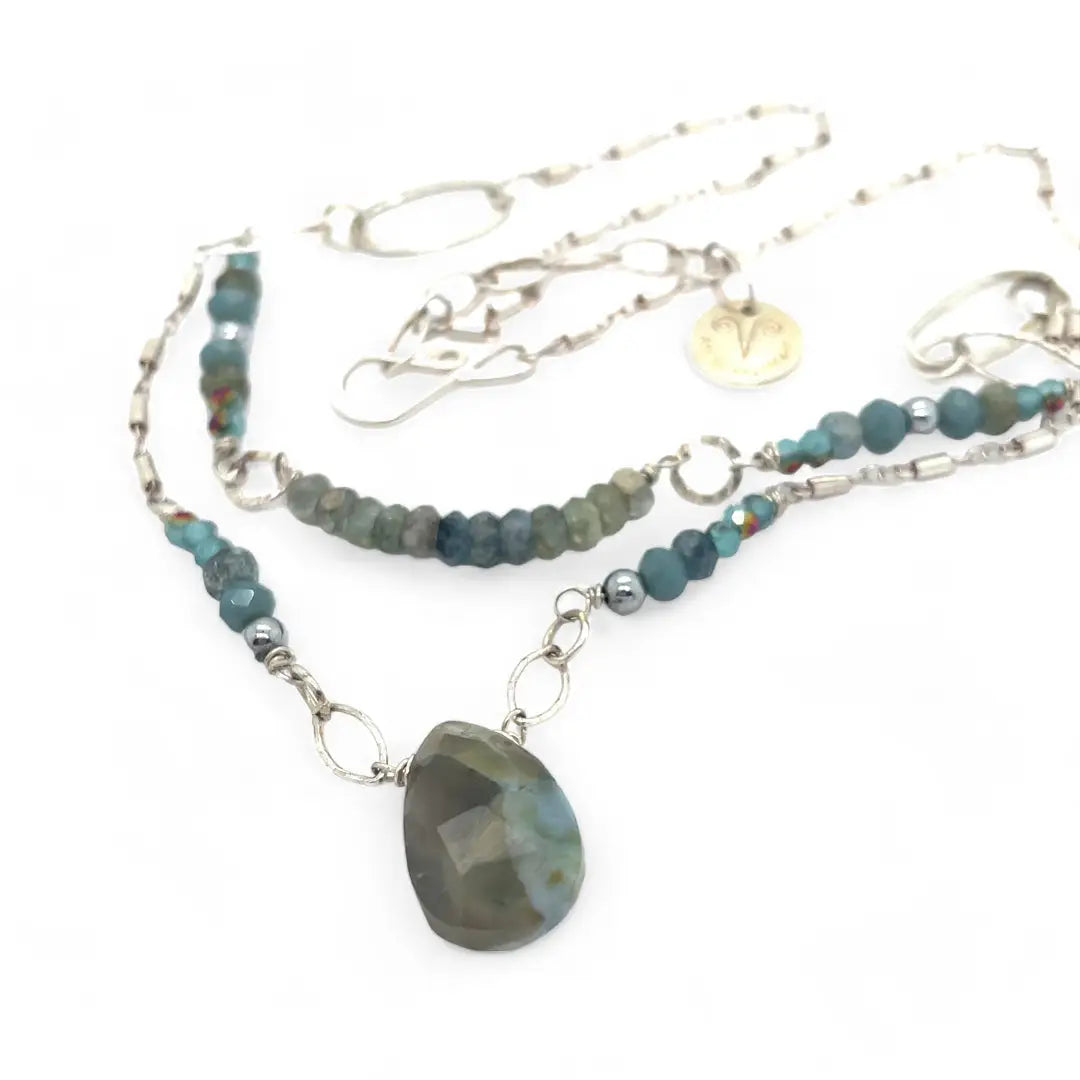 Moss aquamarine, crystal, and green cat's eye faceted gemstones, sparkly sterling links and sterling silver tube chain to form a double layered necklace