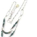 Moss aquamarine, crystal, and green cat's eye faceted gemstones, sparkly sterling links and sterling silver tube chain to form a double layered necklace