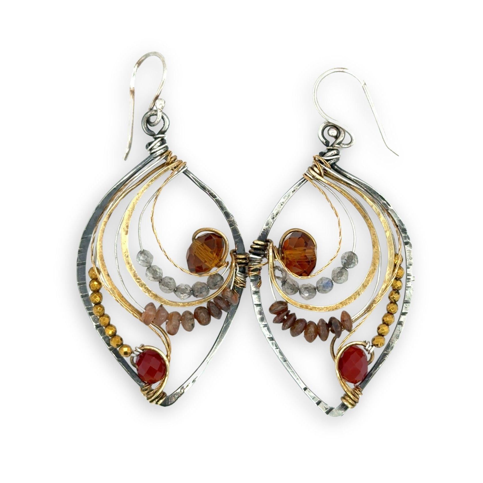 Labradorite, smokey quartz, and pyrite gemstones line autumn amber colored crystals within oxidized sterling silver drop earrings accented with brass and brass twist wire