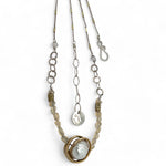a fresh water pearl is held in a brass knot pendant with opal nugget gemstones on gold filled and sterling silver dash chain necklace