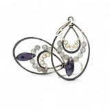 Oxidized sterling silver channel hoop earrings embellished with labradorite gemstones and plum colored crystal drops