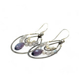 Oxidized sterling silver channel hoop earrings embellished with labradorite gemstones and plum colored crystal drops