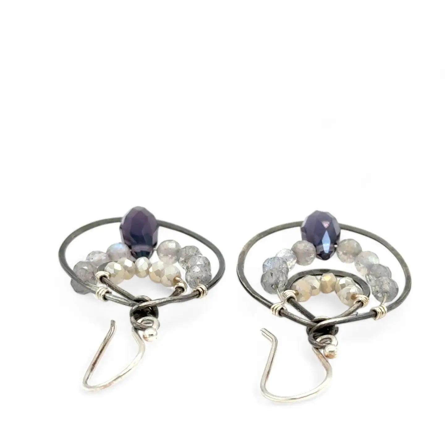 Oxidized sterling silver channel hoop earrings embellished with labradorite gemstones and plum colored crystal drops