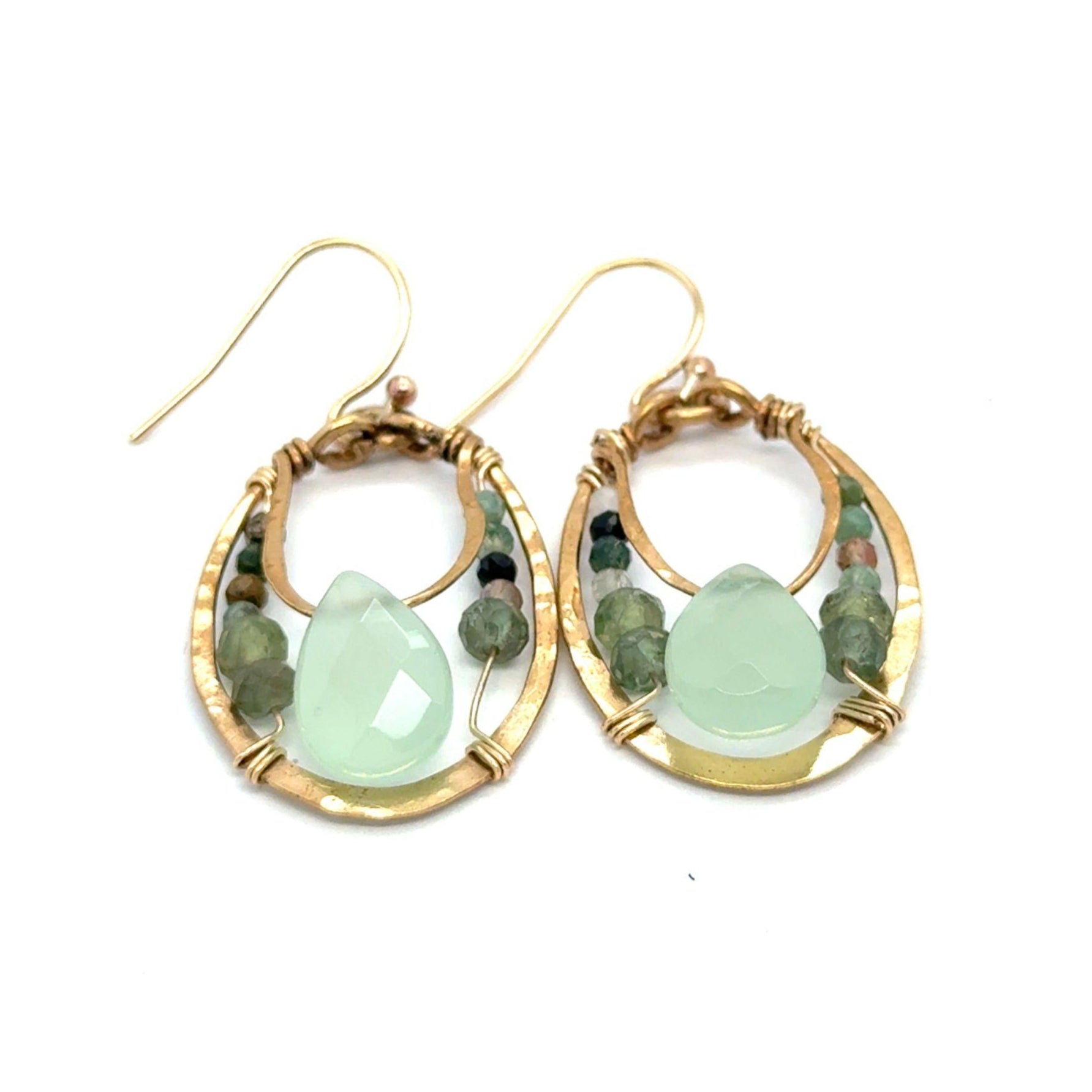 Brass hammered channel hoop earrings filled with fancy jasper, green kyanite. and jade faceted gemstones