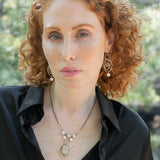 Sterling silver handmade knot pendant holding a lustrous moonstone slab hanging from a ladle of fresh water pearl and moonstone gemstones on a double up darkened sterling silver chain necklace