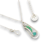 sterling silver necklace with a mini teardrop pendant filled with amazonite, chrysoprase, green opal and apatite gemstones