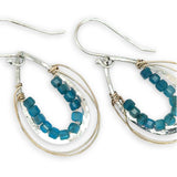 mini hammered sterling silver teardrop earrings wrapped in gold filled wire webbing accented with apatite teal faceted cube gemstones