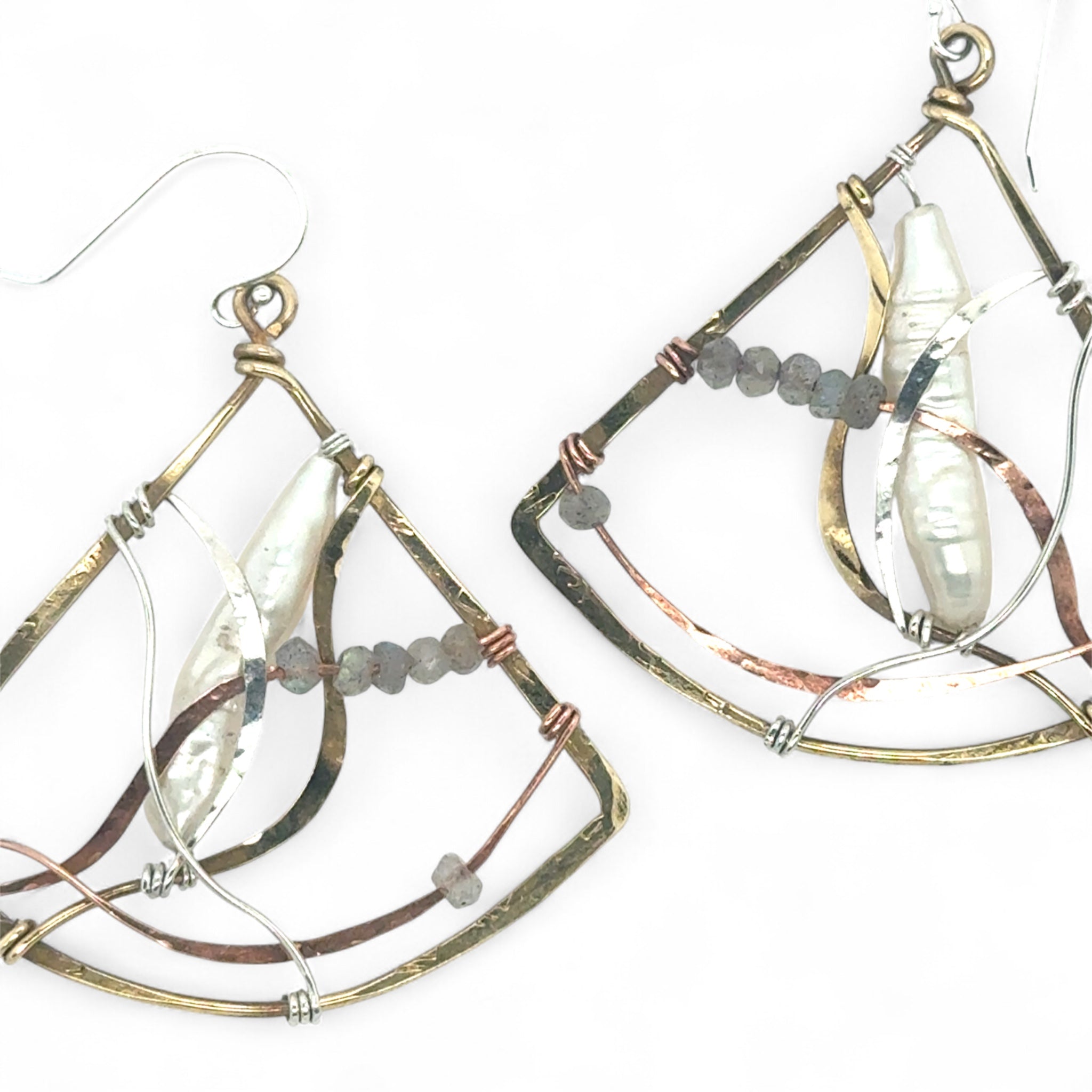 Biwa fresh water stick pearls are cocooned in swishes of copper, brass and sterling silver hammered wires, accented with labradorite gemstones in a large brass hammered fan earrings