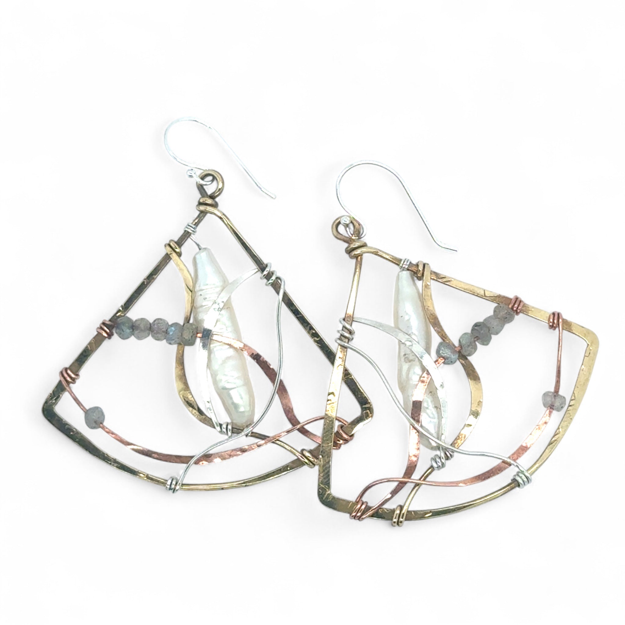 Biwa fresh water stick pearls are cocooned in swishes of copper, brass and sterling silver hammered wires, accented with labradorite gemstones in a large brass hammered fan earrings