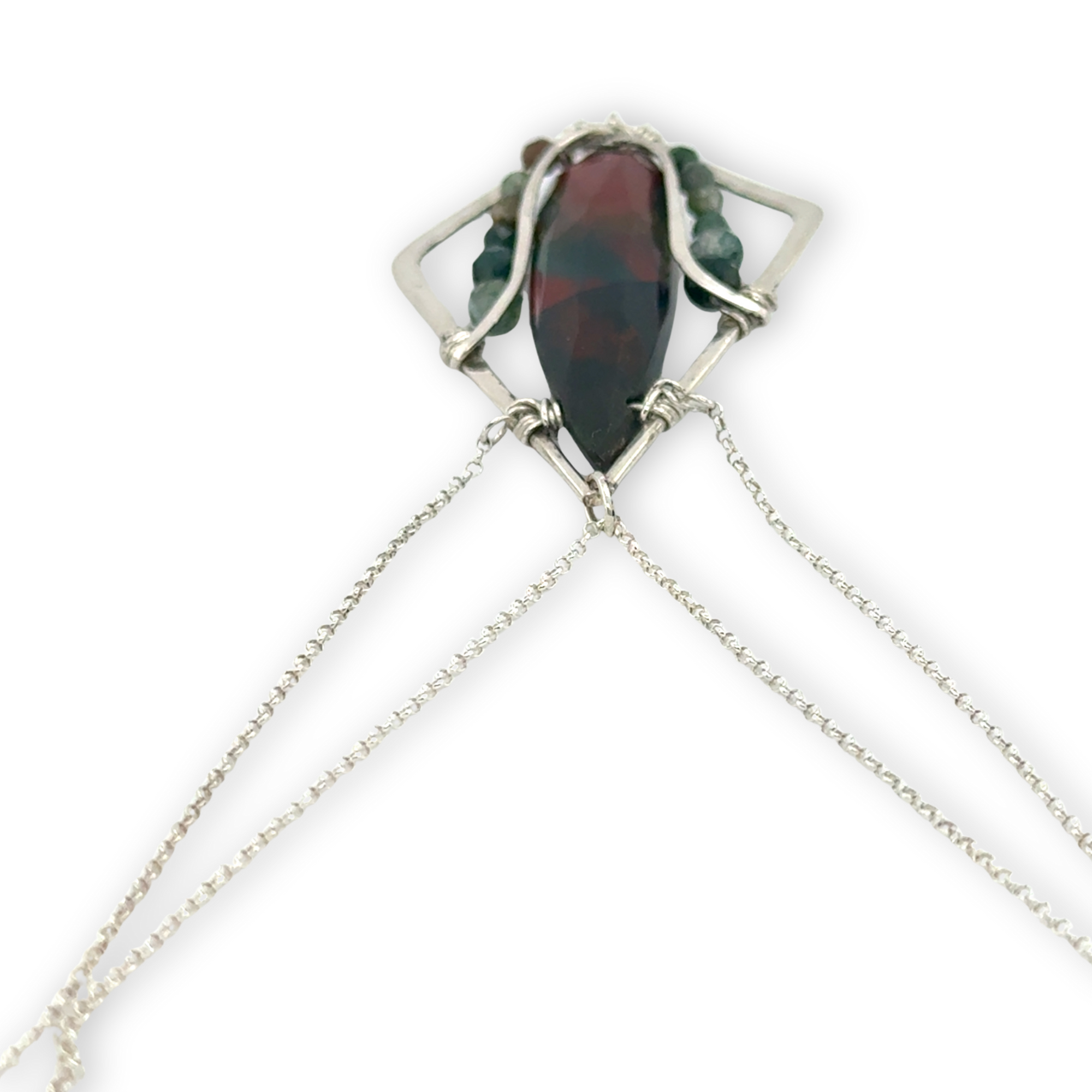 A hammered sterling silver diamond pendant hold a bloodstone faceted skinny drop accented with fancy jasper gemstones, held on a sterling silver dainty double chain necklace