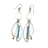 A pair of dangling earrings with sterling silver and bronze semi-circle elements, accented with tiny faceted aqua cat's eye gemstones and labradorite dangles