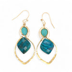 A pair of gold-colored brass earrings with a double drop design, featuring blue green chrysocolla marquise gemstones and chalcedony wrapped in gold filled wire
